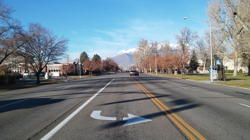 No center median, leaving all five lanes uncontrolled.
